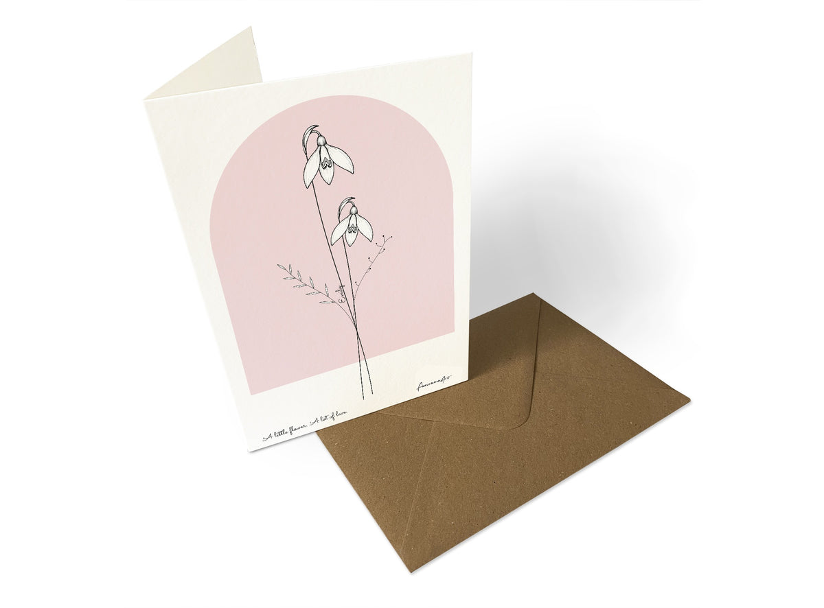 Personalised birth flower greeting card with Emily on the snowdrop stem, a blush arch and a personal message
