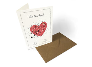 Our Stars Aligned shown as 5 × 7-inch portrait card, personalised with names and meaningful dates.