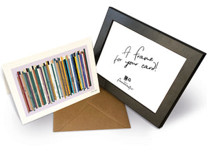Personalised 50th birthday music card, born in 1976, shown as 7x5" greeting card & frame with 50 colourful song spines and a birthday message.