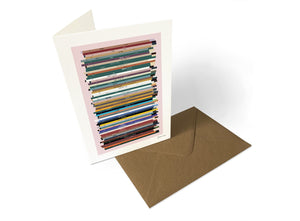 Personalised 60th birthday music card, born in 1966, shown as card portrait with 60 colourful song spines and a birthday message.